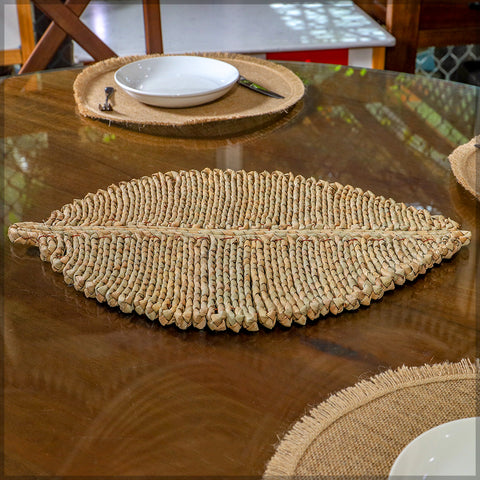 Enhance your dining experience with our Woven Leaf Shaped Place-mats.