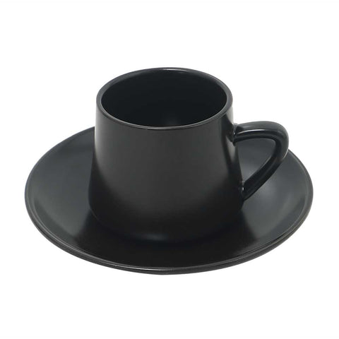 Black porcelain coffee mug with matching saucer on a white background.
