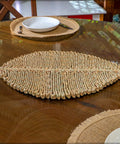 Enhance your dining experience with our Woven Leaf Shaped Place-mats.