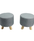 Elevate your living space with our Set of 2 Round Wooden Fabric Footstools - perfect for resting your feet in style! Shop now for cozy elegance.