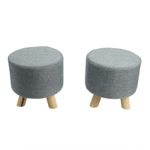 Elevate your living space with our Set of 2 Round Wooden Fabric Footstools - perfect for resting your feet in style! Shop now for cozy elegance.