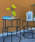 Add a touch of elegance to any room with our Set of 2 Wooden Round Accent Tables. 