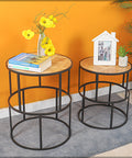 Add a touch of elegance to any room with our Set of 2 Wooden Round Accent Tables. 